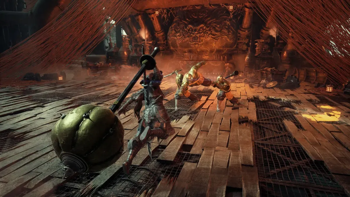 Soul fighting beneath a giant brass bell inside a lantern-lit temple in Phantom Blade Zero